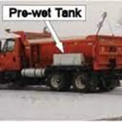 red spreader truck with prewetting tank